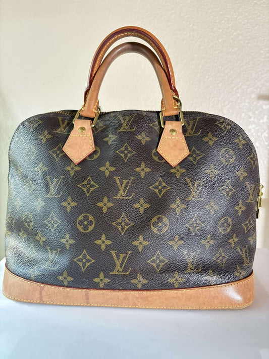 Louis Vuitton Alma MM Monogram Handbag