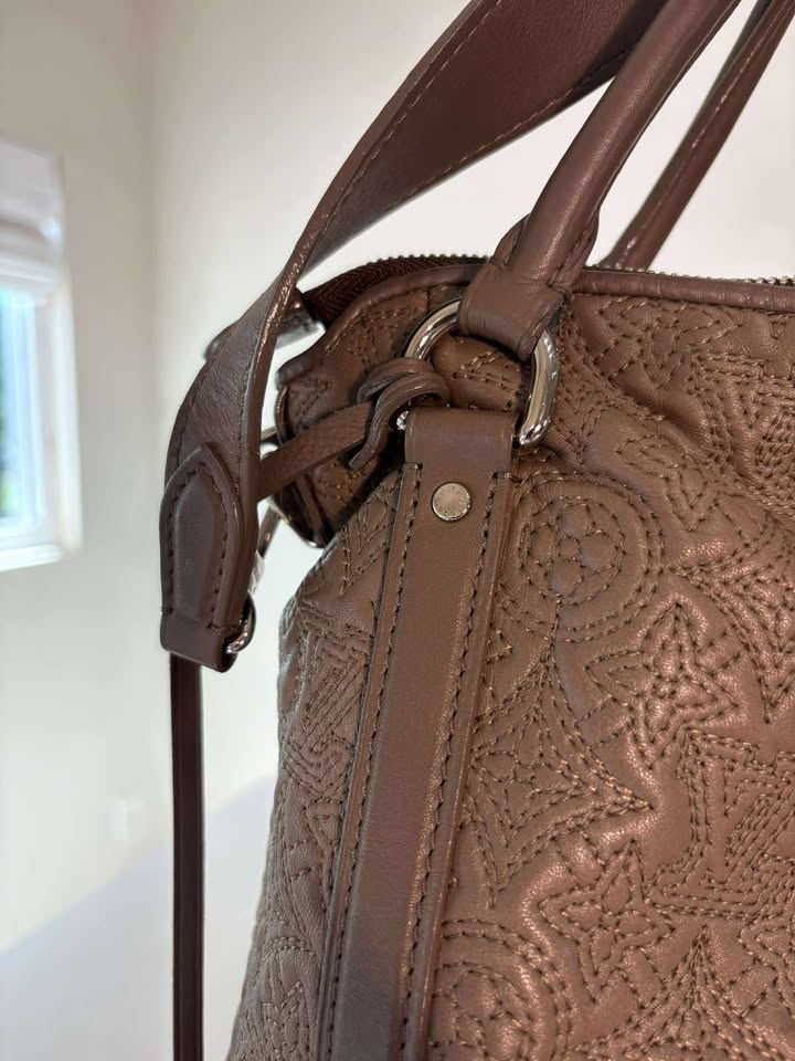 Louis Vuitton Antheia Ixia MM Handbag