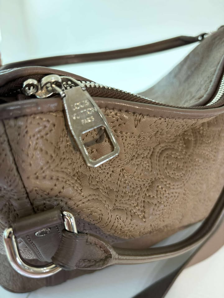 Louis Vuitton Antheia Ixia MM Handbag